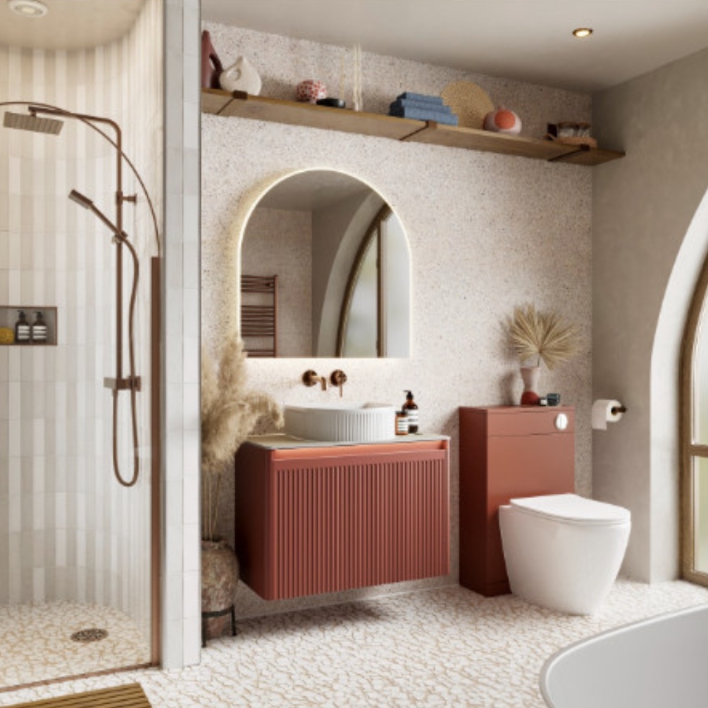 Lifestyle image of the hib. Alba Arch 800mm x 800mm LED Mirror mounted above a red vanity unity & white freestanding basin